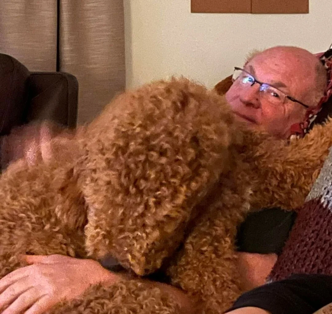 My dad with his beloved dog Mojo headshot